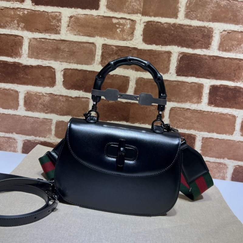 G*u*i top handle bags